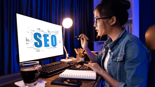 A woman creating her SEO service promotion template